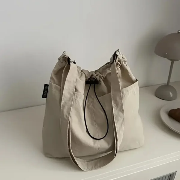 Minimalist Front Pocket Drawstring Handbag - Image 9